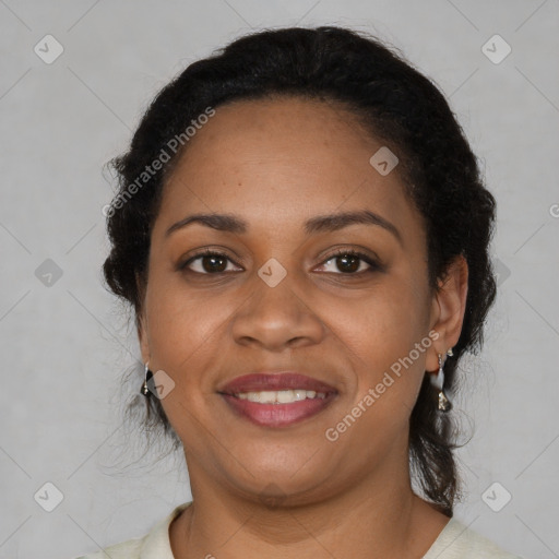 Joyful black young-adult female with medium  black hair and brown eyes