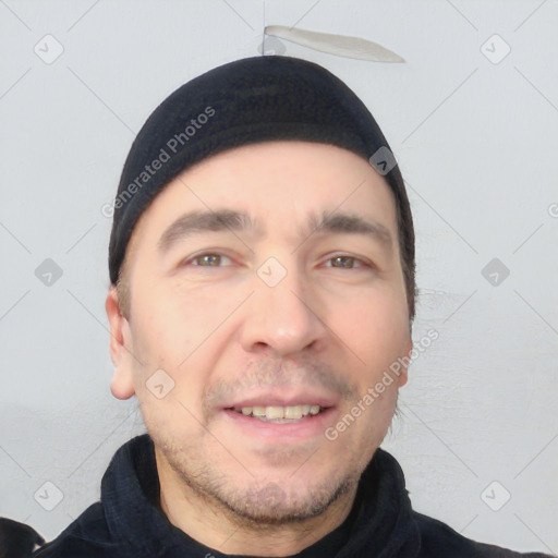 Joyful white young-adult male with short  black hair and brown eyes