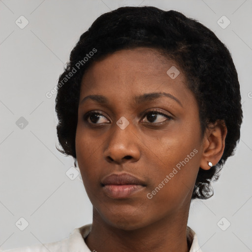 Neutral black young-adult female with short  black hair and brown eyes