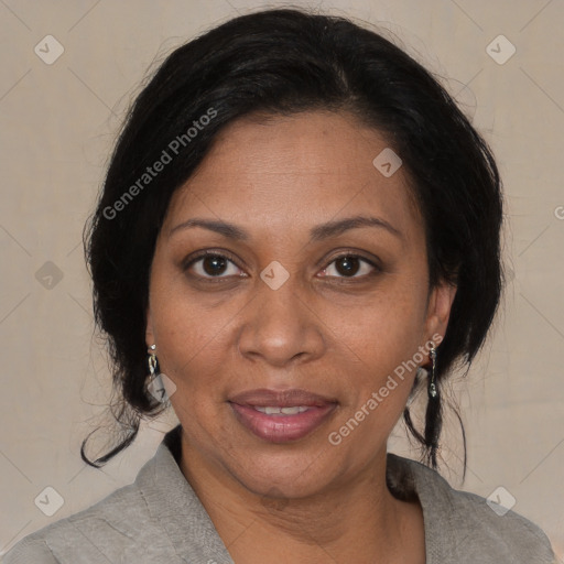 Joyful black adult female with medium  brown hair and brown eyes