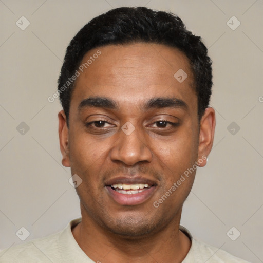 Joyful black young-adult male with short  black hair and brown eyes