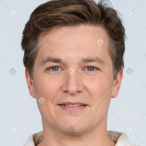 Joyful white adult male with short  brown hair and grey eyes