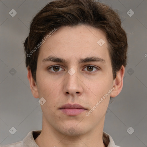 Neutral white young-adult male with short  brown hair and grey eyes