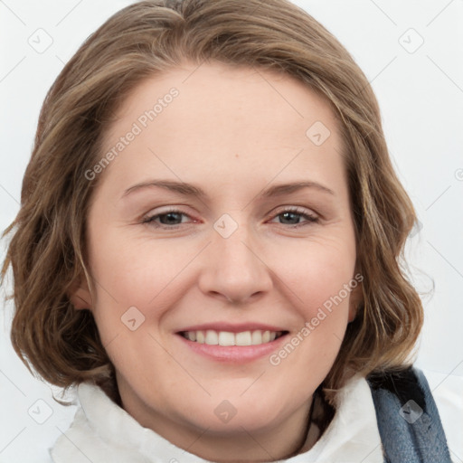 Joyful white young-adult female with medium  brown hair and blue eyes