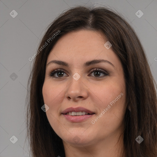 Joyful white young-adult female with long  brown hair and brown eyes