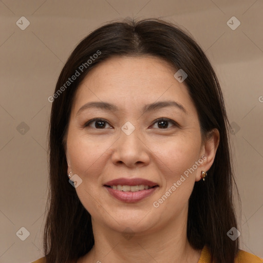 Joyful white adult female with medium  brown hair and brown eyes