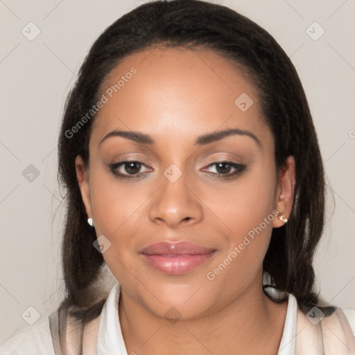 Joyful latino young-adult female with medium  brown hair and brown eyes