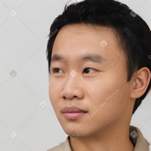 Neutral asian young-adult male with short  black hair and brown eyes