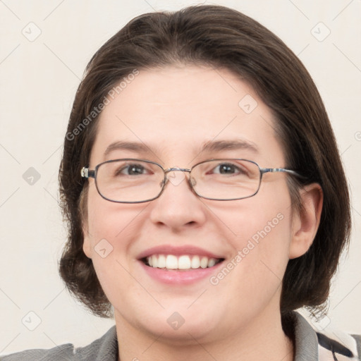 Joyful white young-adult female with medium  brown hair and blue eyes