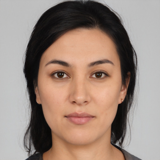 Neutral white young-adult female with medium  black hair and brown eyes