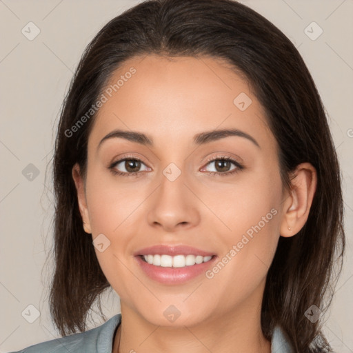 Joyful white young-adult female with medium  brown hair and brown eyes