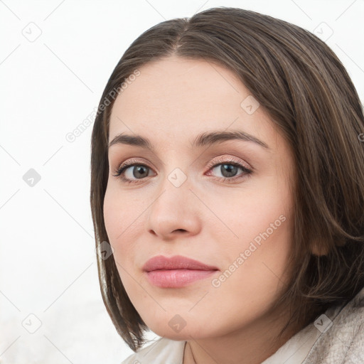 Neutral white young-adult female with long  brown hair and grey eyes