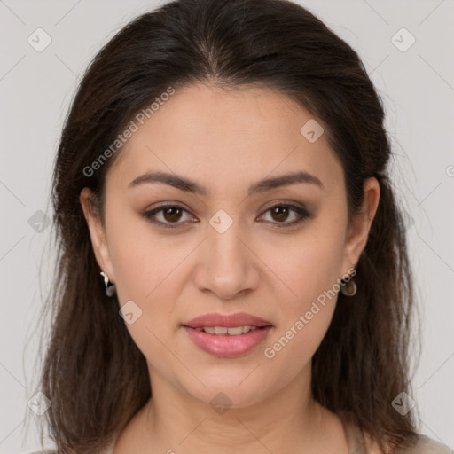 Joyful white young-adult female with long  brown hair and brown eyes