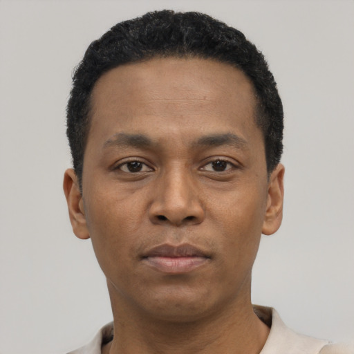 Neutral black young-adult male with short  black hair and brown eyes