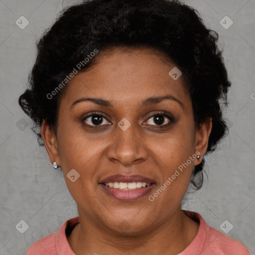 Joyful black adult female with short  brown hair and brown eyes