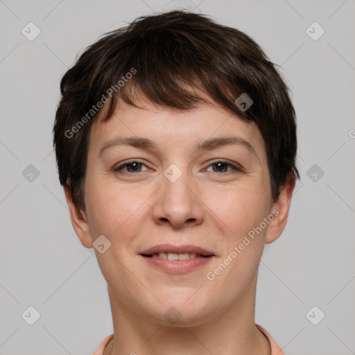 Joyful white young-adult female with short  brown hair and brown eyes