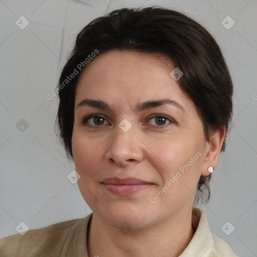 Joyful white adult female with short  brown hair and brown eyes