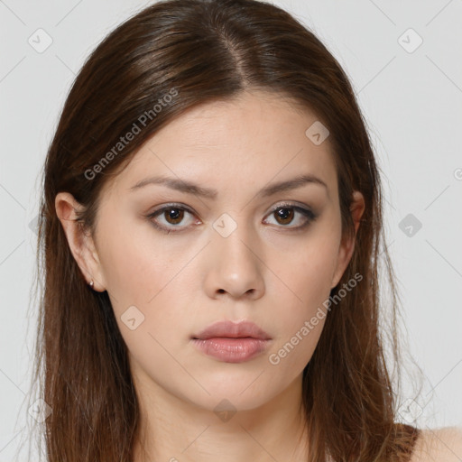 Neutral white young-adult female with long  brown hair and brown eyes