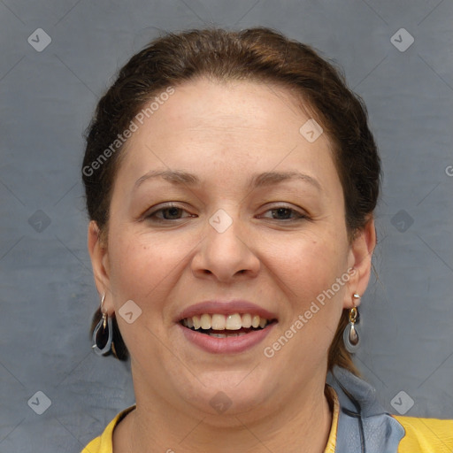 Joyful white adult female with short  brown hair and grey eyes