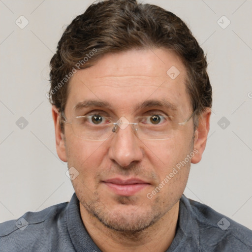 Joyful white adult male with short  brown hair and grey eyes