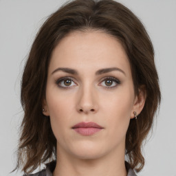 Neutral white young-adult female with medium  brown hair and brown eyes