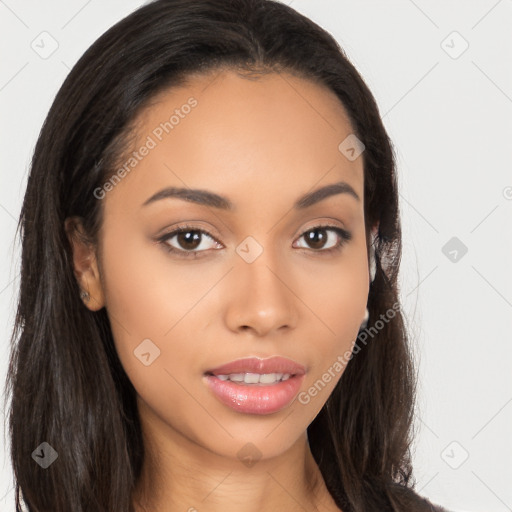 Joyful latino young-adult female with long  brown hair and brown eyes