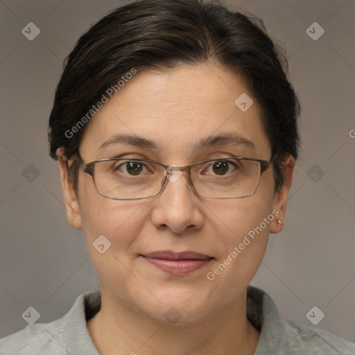 Joyful white adult female with short  brown hair and brown eyes