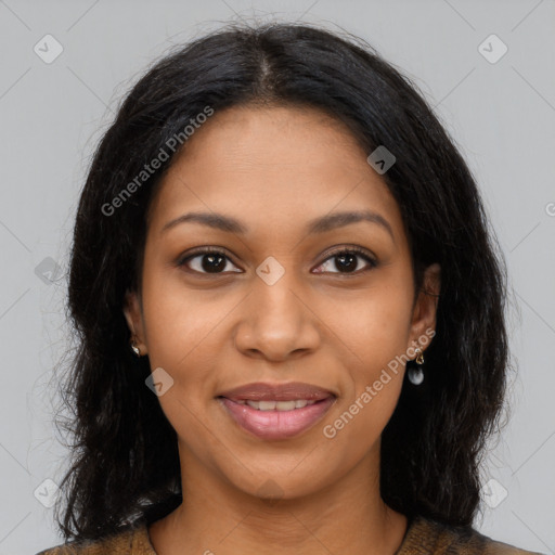 Joyful black young-adult female with long  brown hair and brown eyes