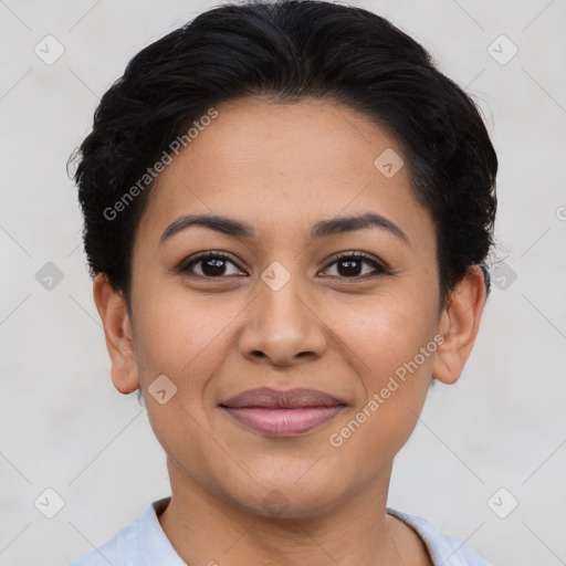 Joyful latino young-adult female with short  brown hair and brown eyes