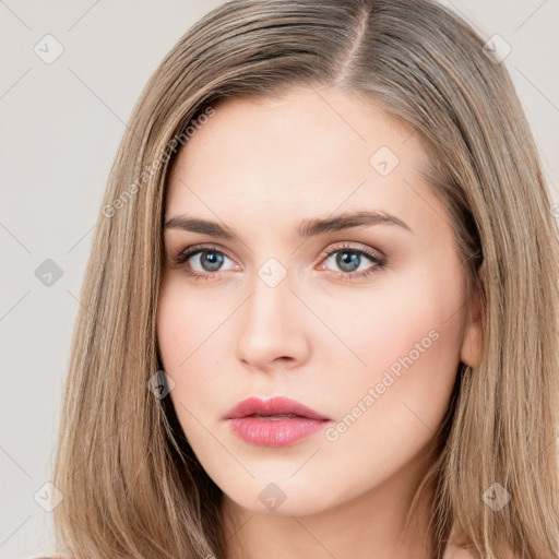 Neutral white young-adult female with long  brown hair and brown eyes