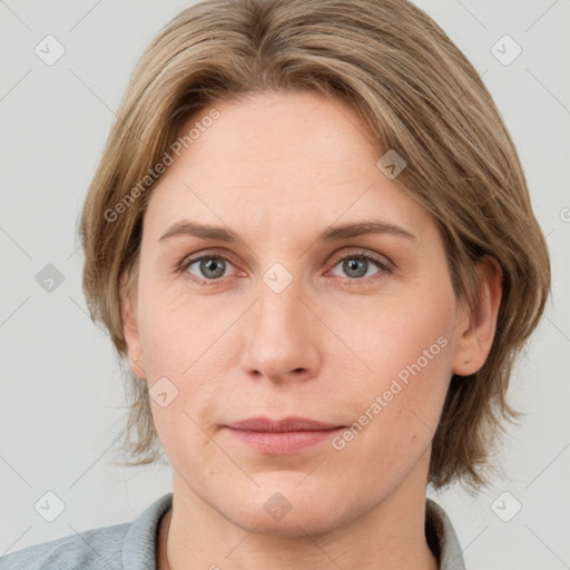 Joyful white young-adult female with medium  brown hair and blue eyes