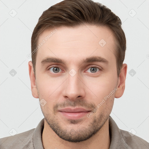 Neutral white young-adult male with short  brown hair and grey eyes