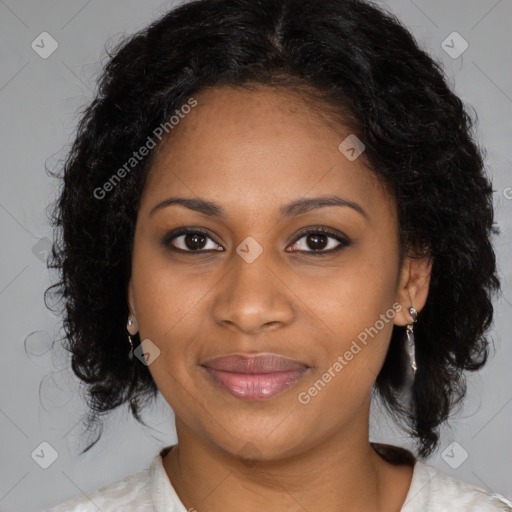 Joyful black young-adult female with medium  brown hair and brown eyes