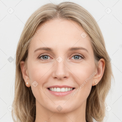 Joyful white young-adult female with long  brown hair and grey eyes