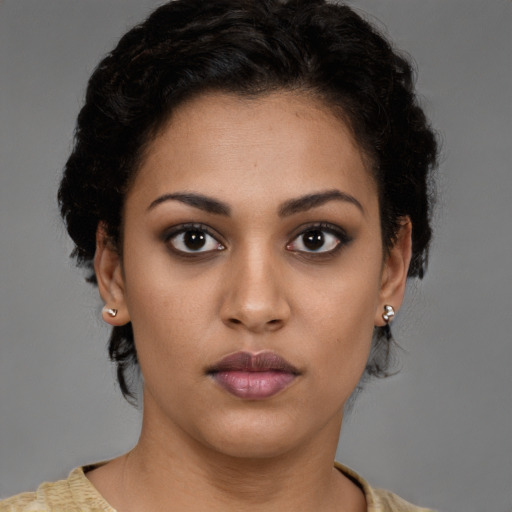 Neutral latino young-adult female with short  brown hair and brown eyes
