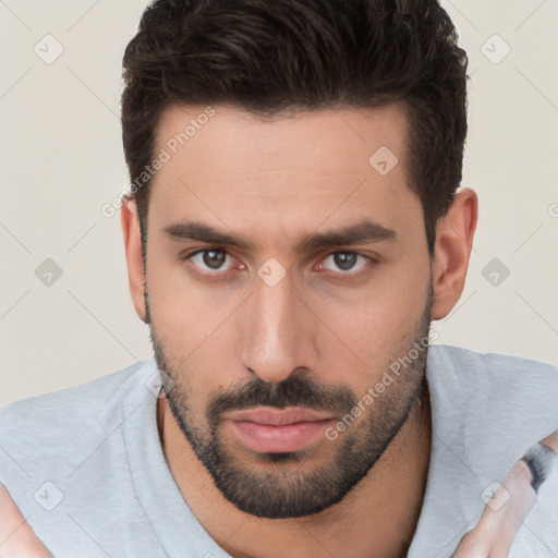 Neutral white young-adult male with short  brown hair and brown eyes