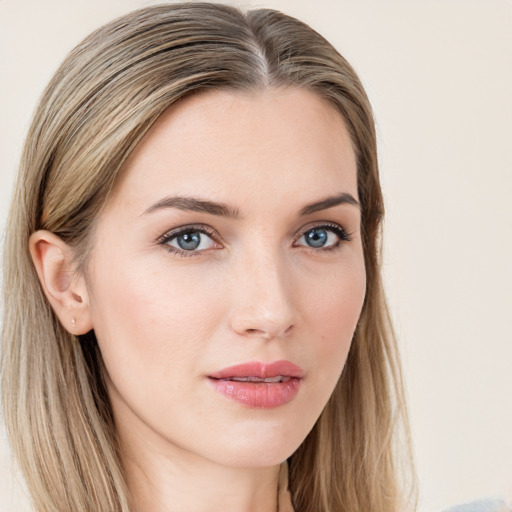 Neutral white young-adult female with long  brown hair and blue eyes