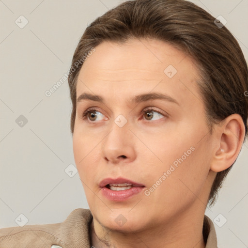 Neutral white young-adult female with short  brown hair and brown eyes