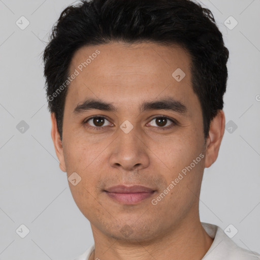 Joyful white young-adult male with short  black hair and brown eyes