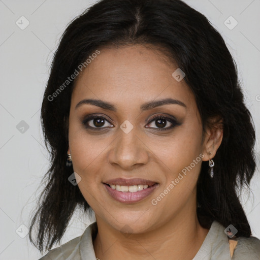 Joyful black young-adult female with long  brown hair and brown eyes
