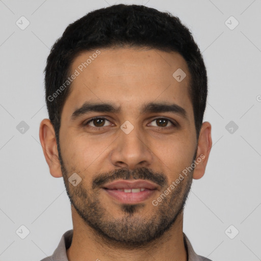 Joyful latino young-adult male with short  black hair and brown eyes