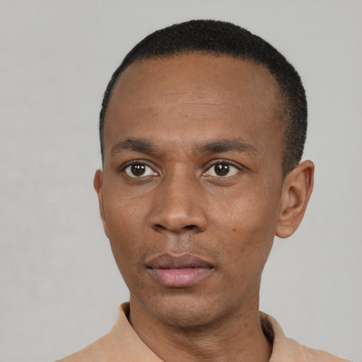 Neutral black young-adult male with short  black hair and brown eyes