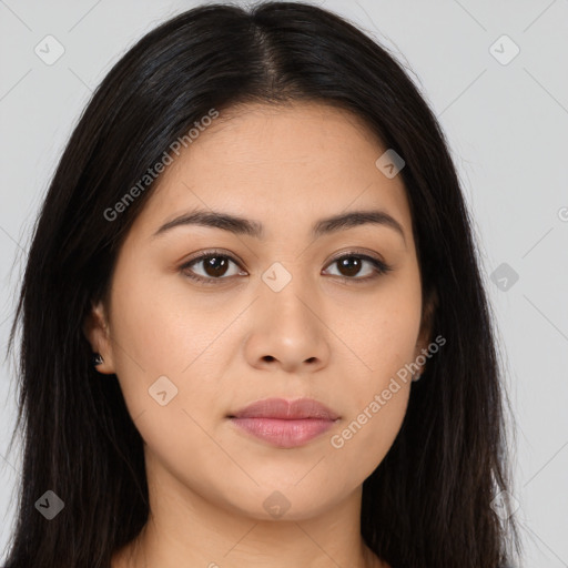 Joyful asian young-adult female with long  brown hair and brown eyes