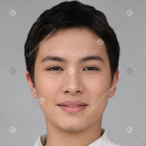 Joyful asian young-adult male with short  brown hair and brown eyes