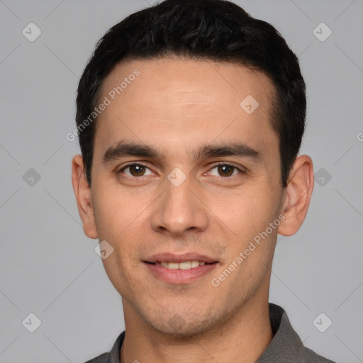 Joyful white young-adult male with short  black hair and brown eyes