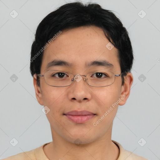 Joyful asian young-adult male with short  brown hair and brown eyes