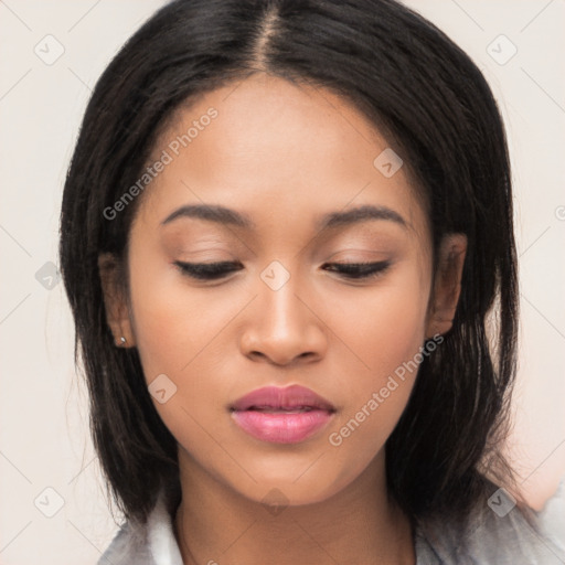 Joyful asian young-adult female with long  brown hair and brown eyes