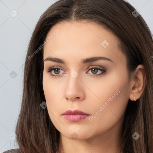 Neutral white young-adult female with long  brown hair and brown eyes