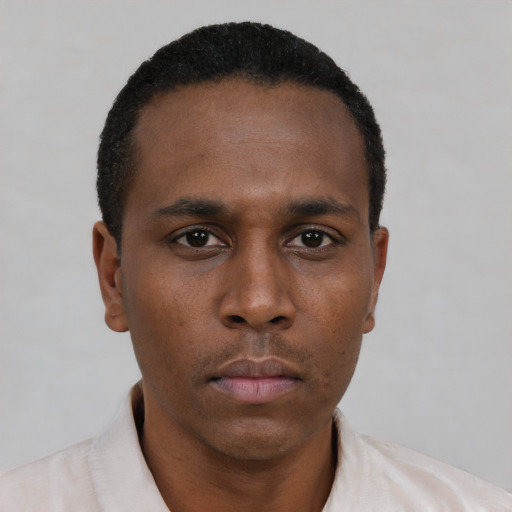 Neutral black young-adult male with short  black hair and brown eyes