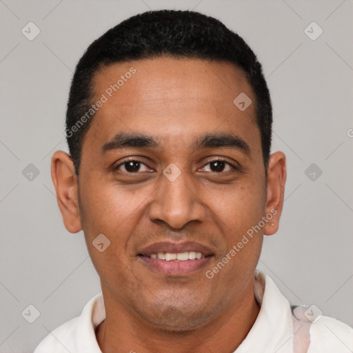 Joyful latino young-adult male with short  black hair and brown eyes